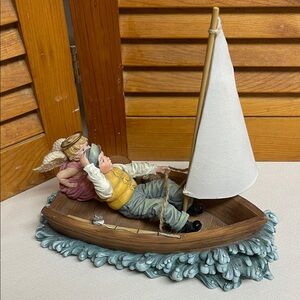 Demdaco Boy and Angel Sailboat Figurine - White Sail, Blue Waves